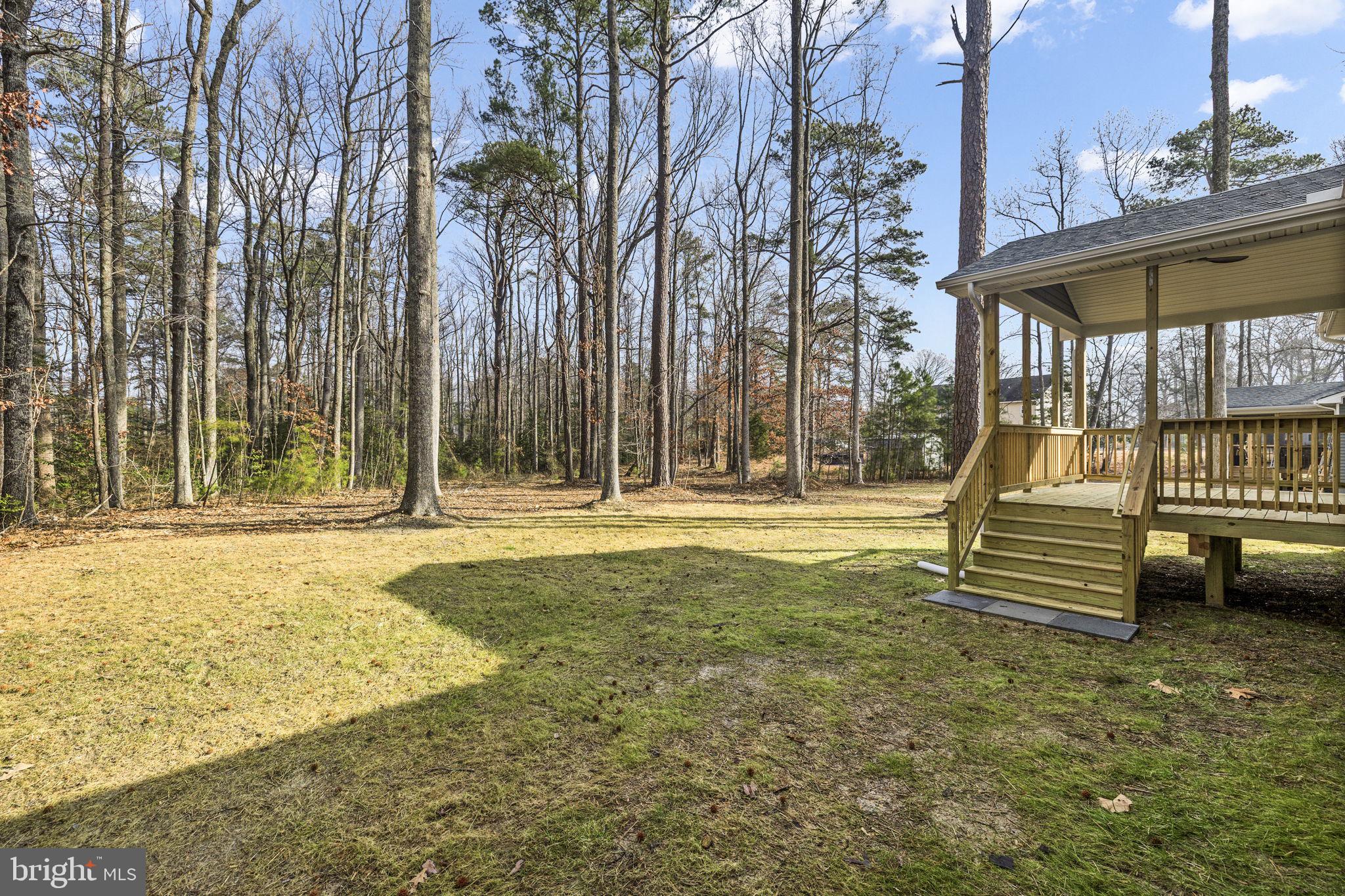 27 Colony Way Montross, VA 22520 - Photo 37 of 90 a swimming pool with outdoor seating and yard