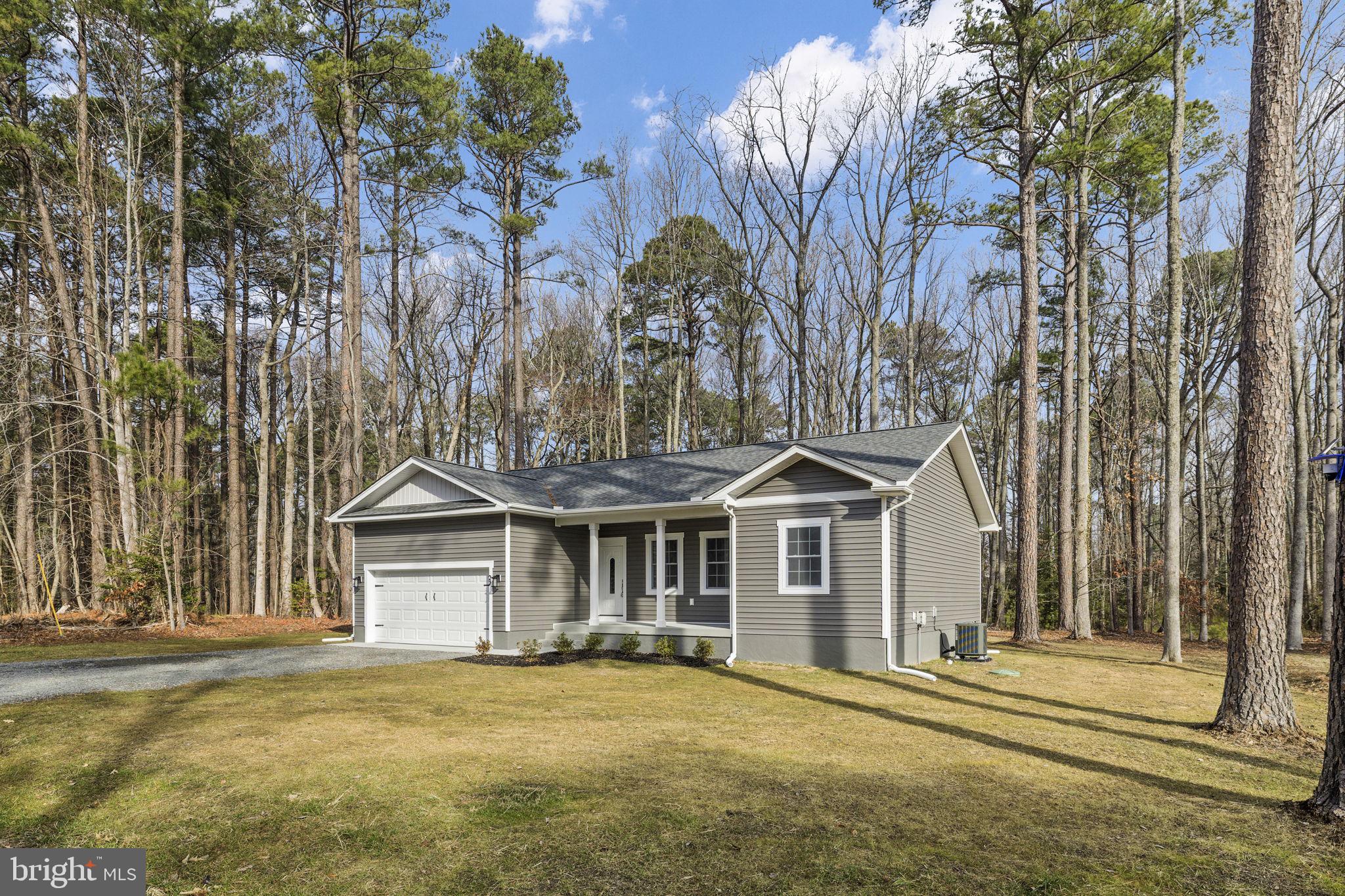 27 Colony Way Montross, VA 22520 - Photo 41 of 90 a front view of a house with a garden
