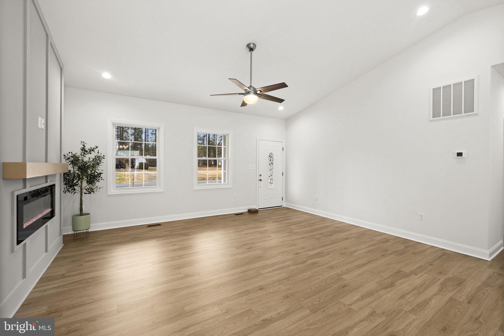 27 Colony Way Montross, VA 22520 - Photo 10 of 90 a view of livingroom with hardwood floor and a ceiling fan