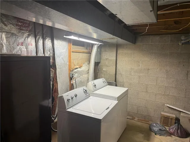 a bathroom with a sink a mirror and a shower