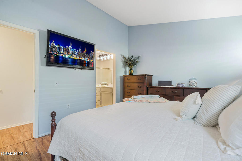 2040 Freesia Avenue Simi Valley, CA 93063 - Photo 17 of 26 a bedroom with a bed and a closet