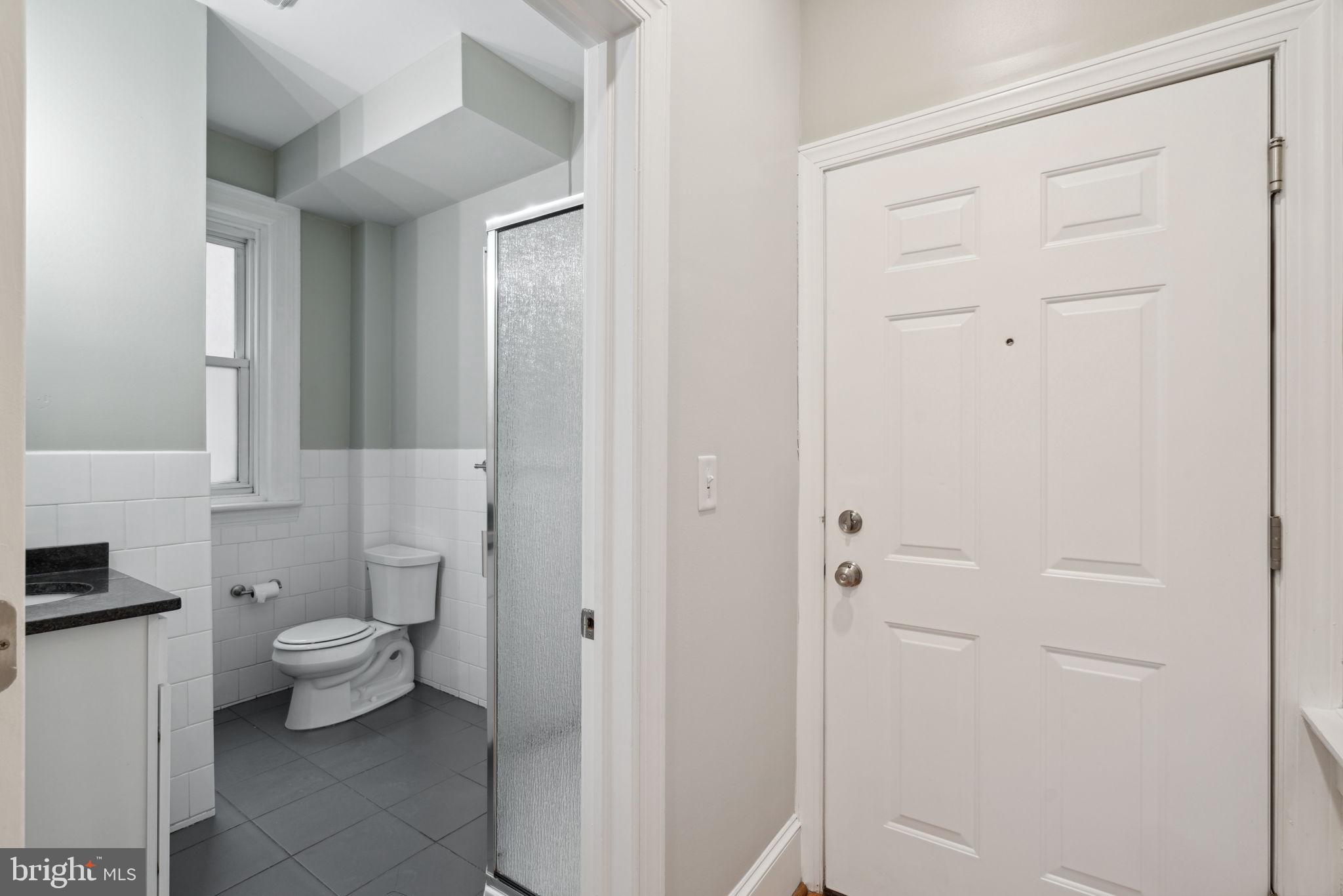 1955 Locust Street, Unit 2R Philadelphia, PA 19103 - Photo 11 of 19 a bathroom with a toilet