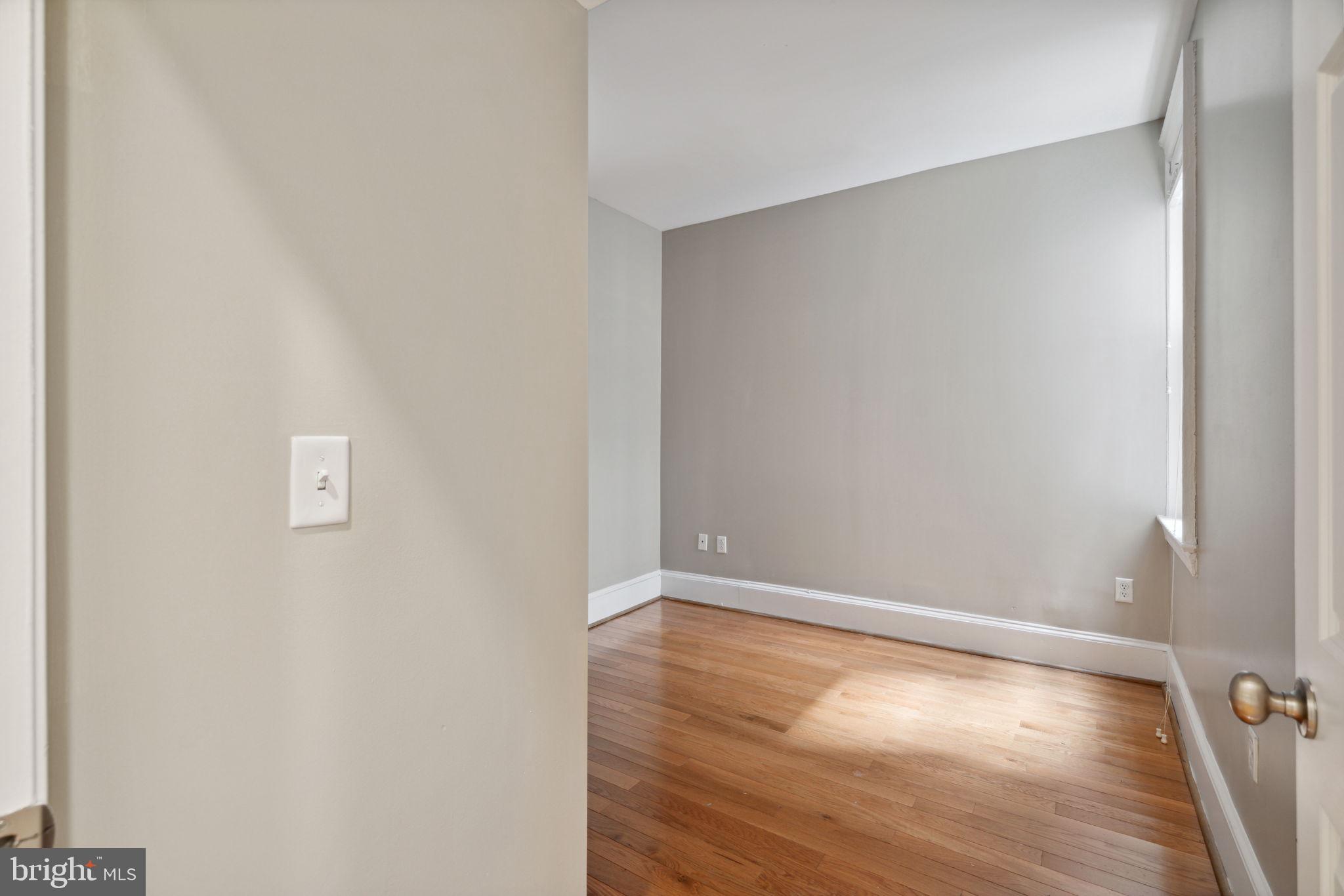 1955 Locust Street, Unit 2R Philadelphia, PA 19103 - Photo 7 of 19 a view of room with hardwood floor