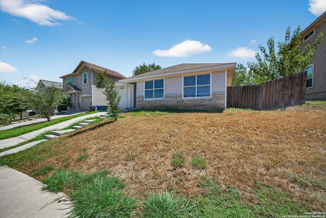 a house view with a outdoor space