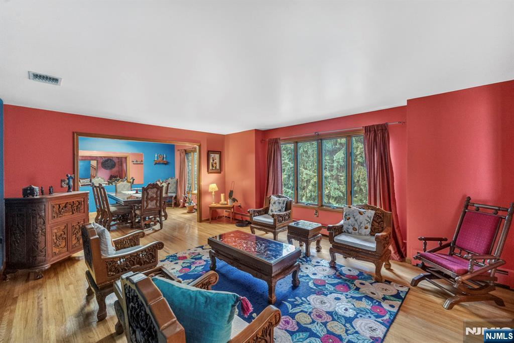 5110 Berkshire Valley Road Oak Ridge, NJ 07438 - Photo 7 of 49 a living room with furniture and a window