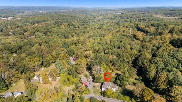 a view of a field with a houses