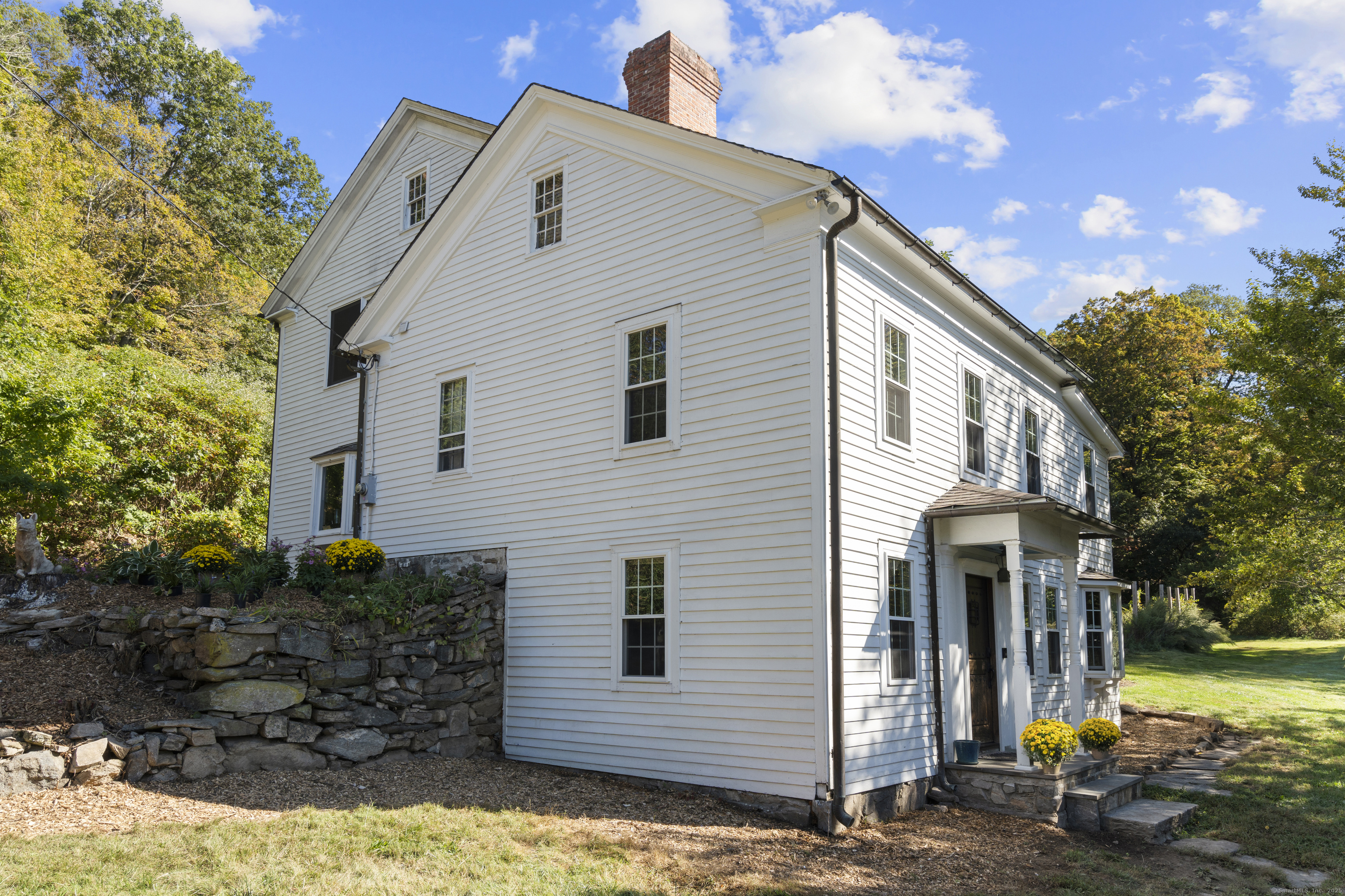 62 Codfish Hill Road Bethel, CT 06801 - Photo 3 of 25 a view of a house with a yard