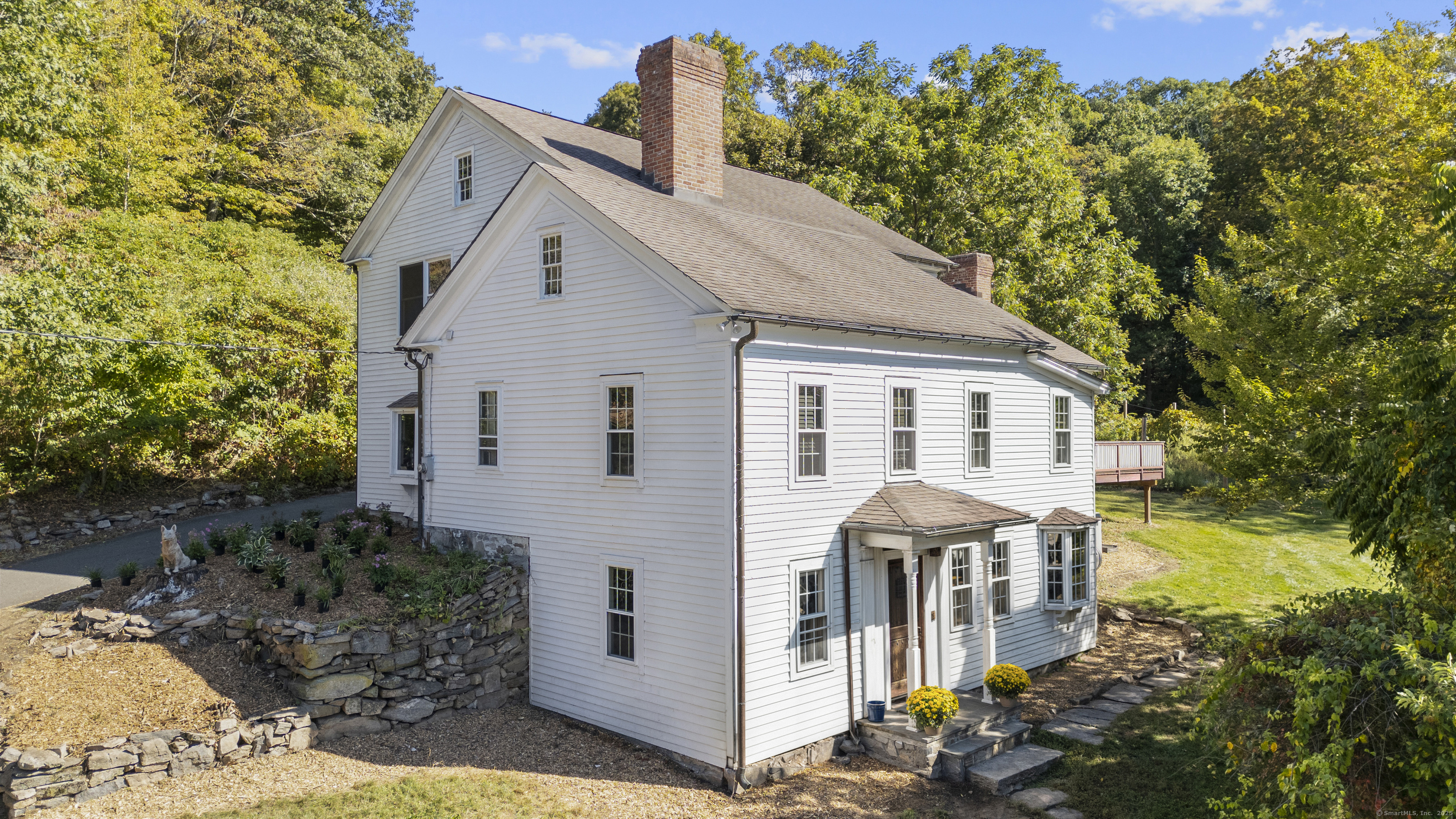 62 Codfish Hill Road Bethel, CT 06801 - Photo 4 of 25 a front view of a house with a yard