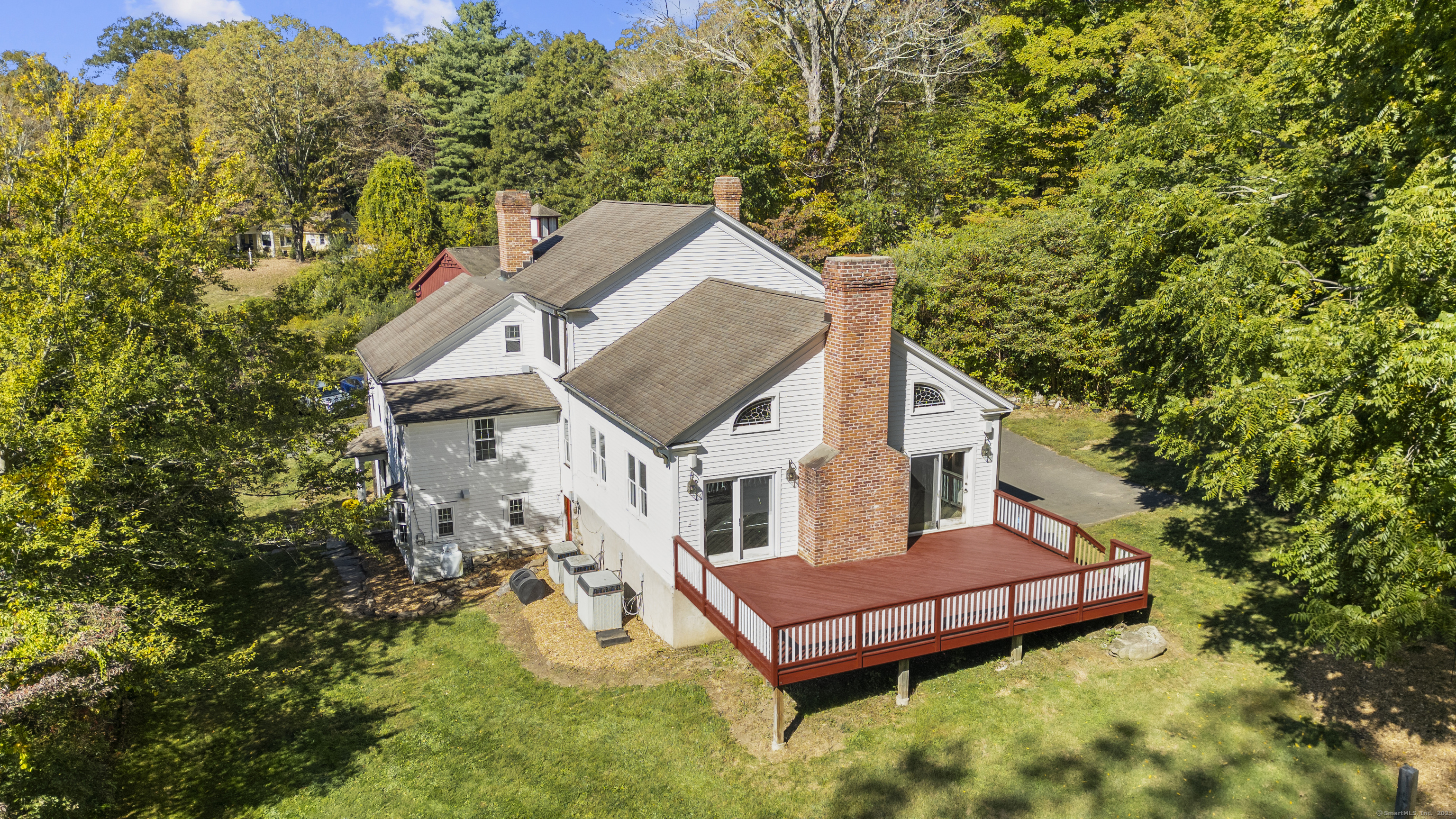 62 Codfish Hill Road Bethel, CT 06801 - Photo 9 of 25 a view of a house with a yard balcony and wooden fence