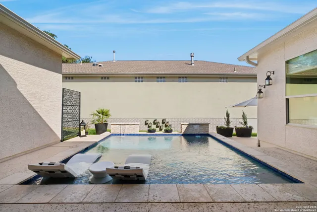 a view of living room with furniture and window