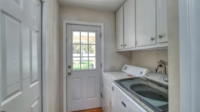 a kitchen with a stove and cabinets