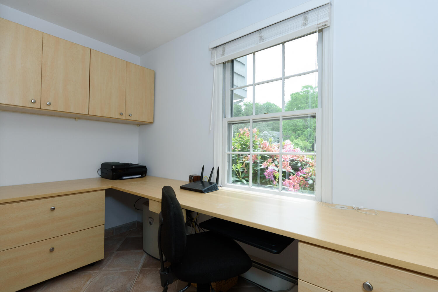 32 Barringer Road Darien, CT 06820 - Photo 16 of 28 a room with a table chairs and a window