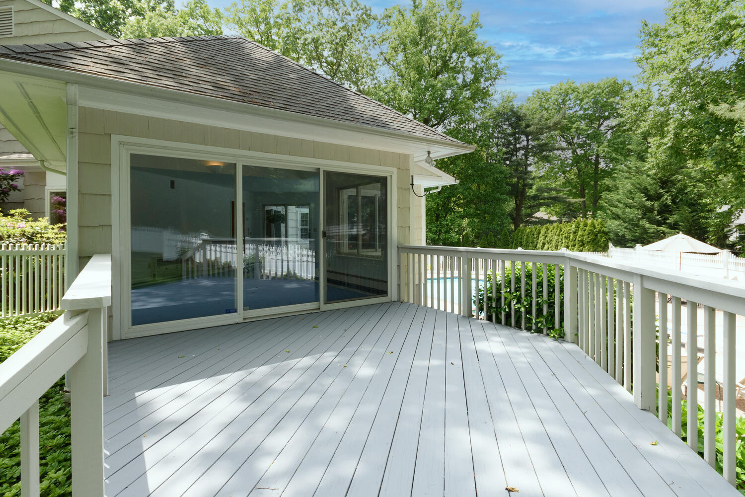 32 Barringer Road Darien, CT 06820 - Photo 21 of 28 a view of backyard with deck and outdoor seating