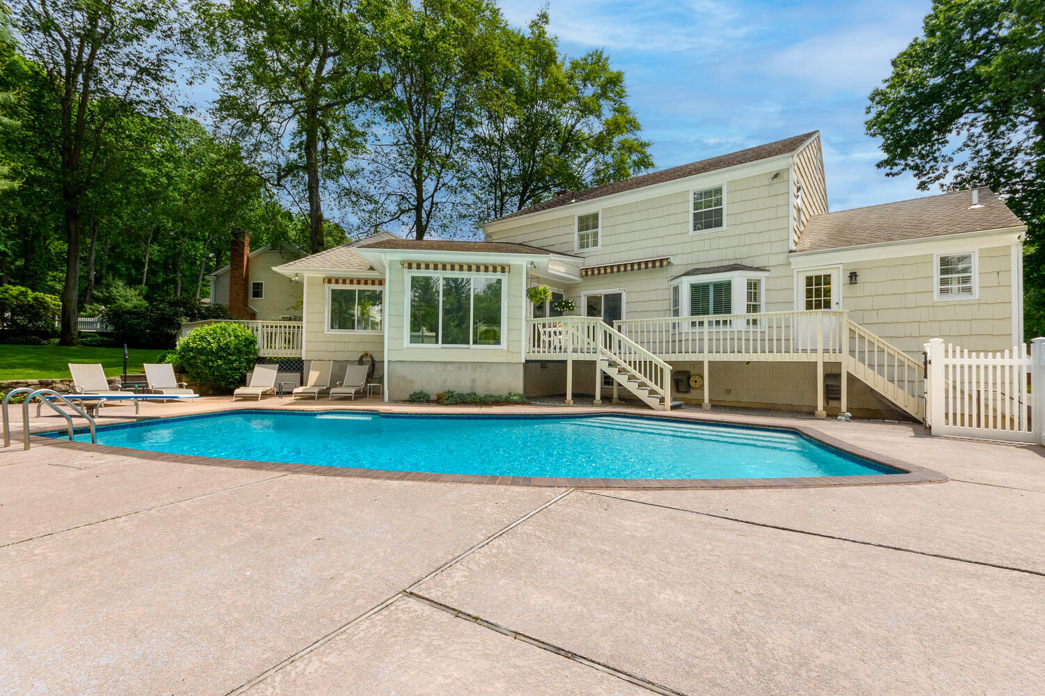 32 Barringer Road Darien, CT 06820 - Photo 22 of 28 a front view of house with yard and green space