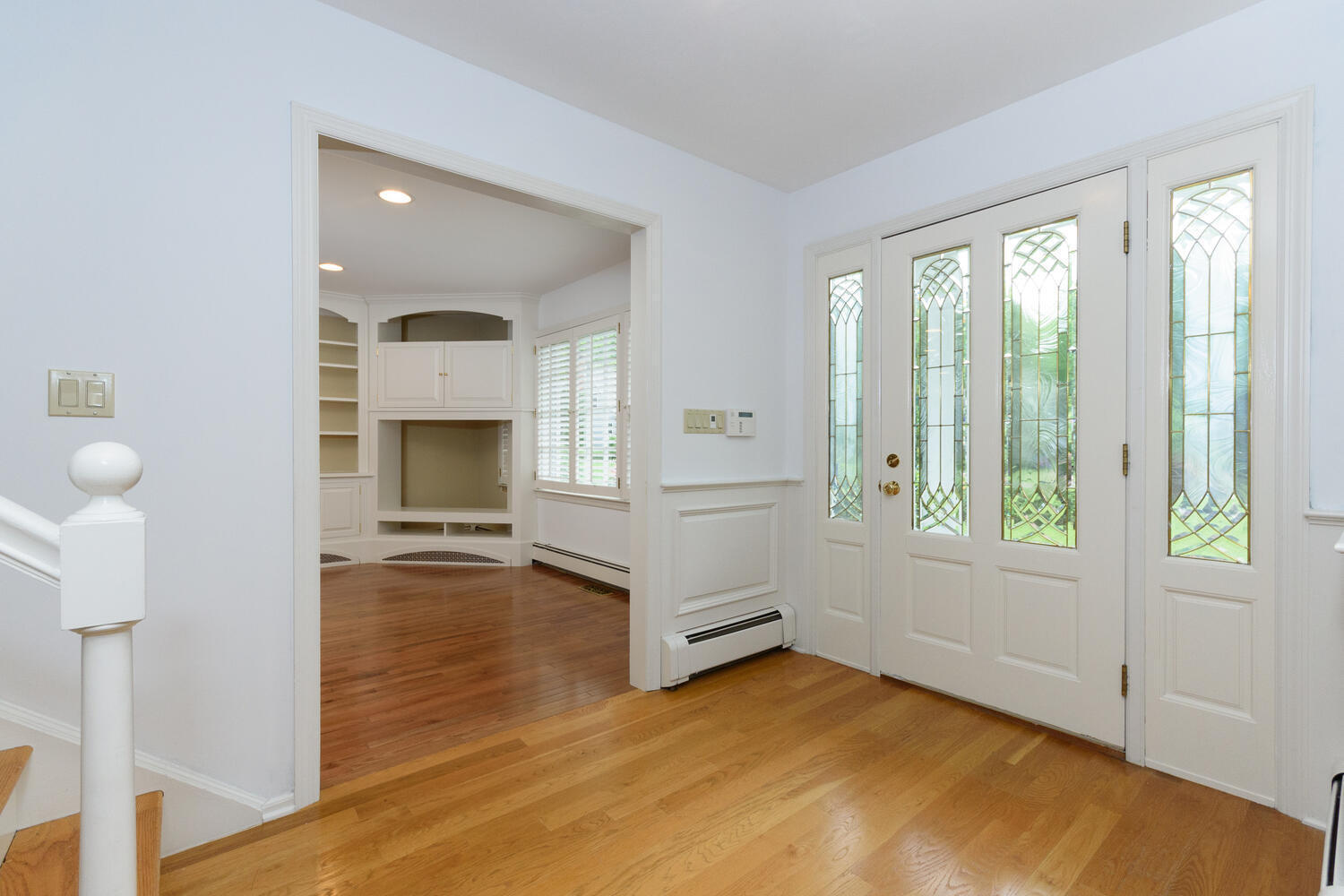 32 Barringer Road Darien, CT 06820 - Photo 4 of 28 a view of an empty room with furniture and a window