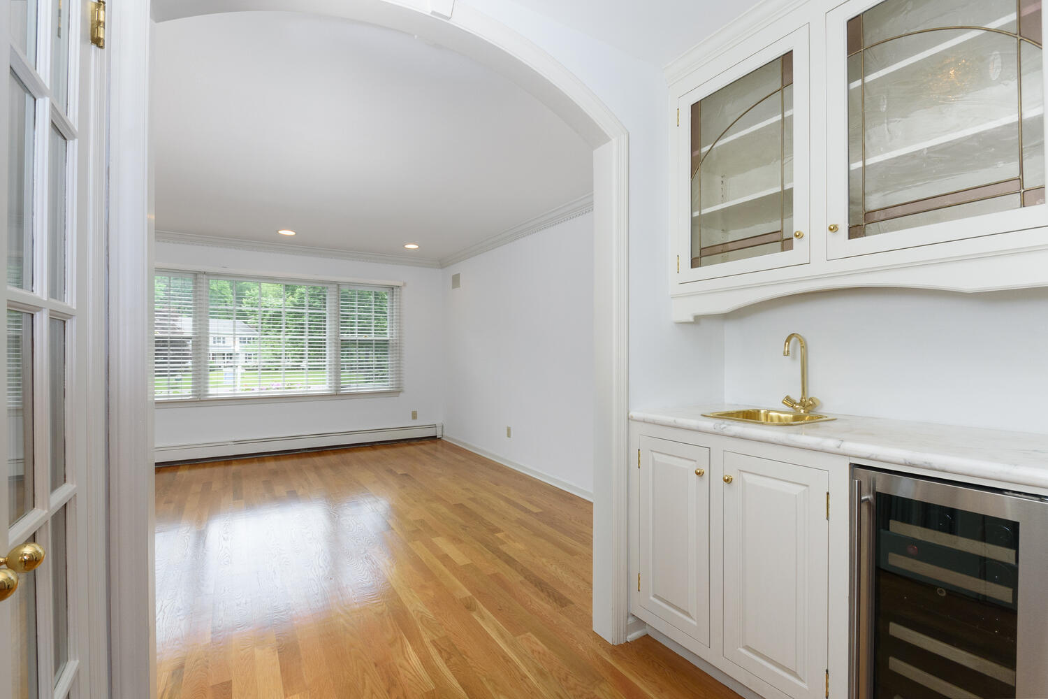 32 Barringer Road Darien, CT 06820 - Photo 6 of 28 a view of a kitchen with a sink cabinets and a window
