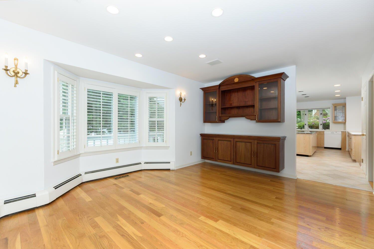 32 Barringer Road Darien, CT 06820 - Photo 7 of 28 a view of an empty room with a kitchen and window
