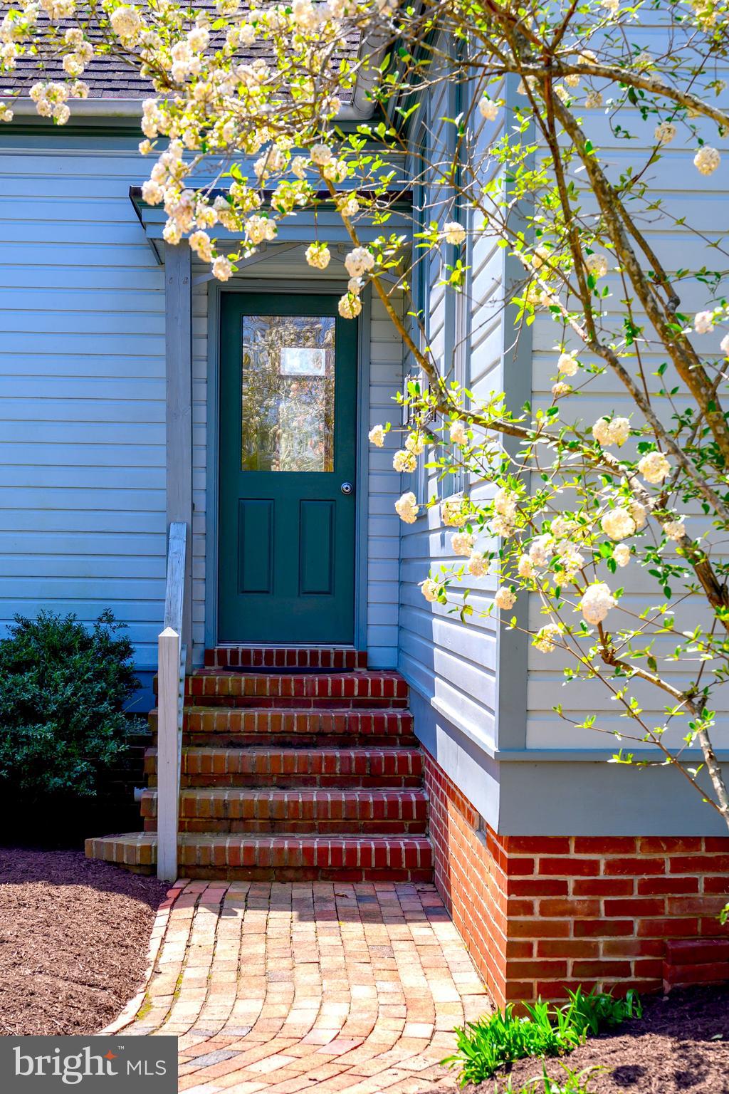 26090 Royal Oak Road Easton, MD 21601 - Photo 58 of 74 Rear door from pool to 1st floor guest full bath