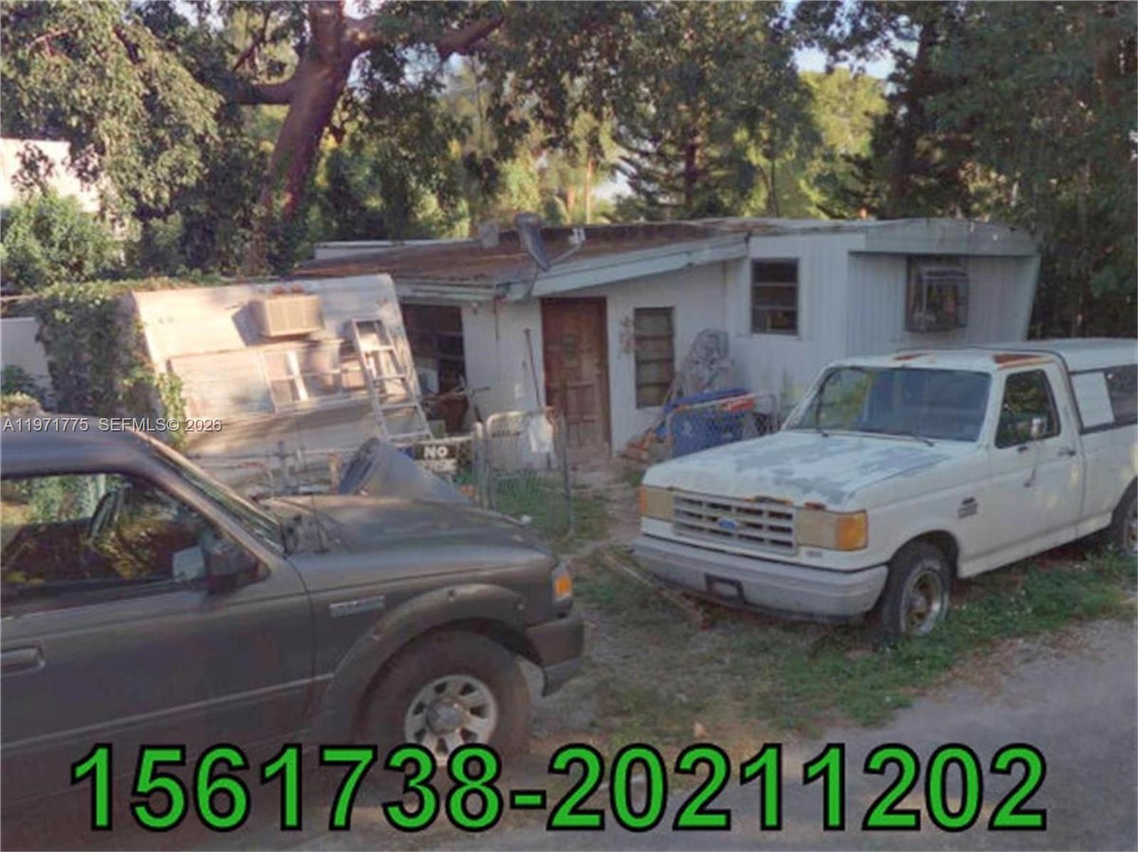 2 Janet Place Key Largo, FL 33037 - Photo 3 of 3 a front view of a house with parking