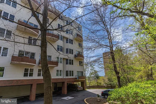 a view of a building with a yard