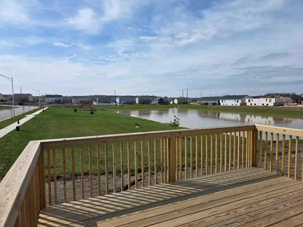 a terrace with a lake view