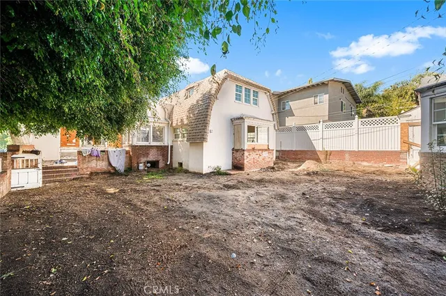 a view of a balcony with wooden floor