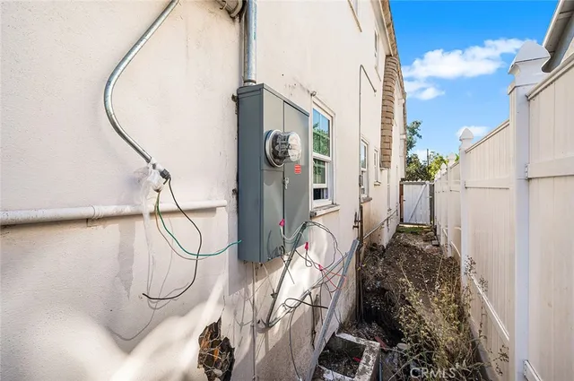 a view of a house with a tree