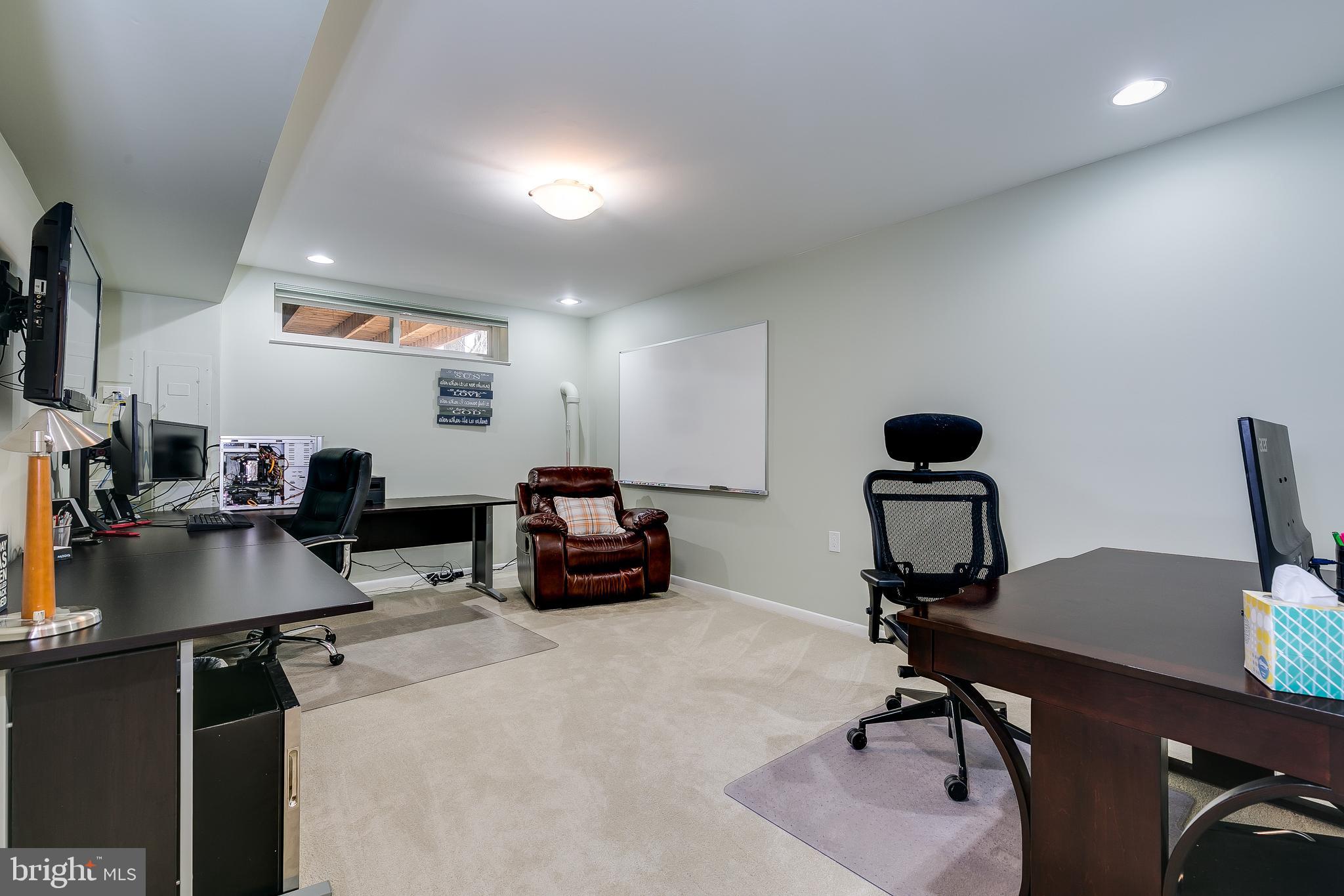 1589 Inlet Court Reston, VA 20190 - Photo 23 of 36 One of two large spaces in the lower level