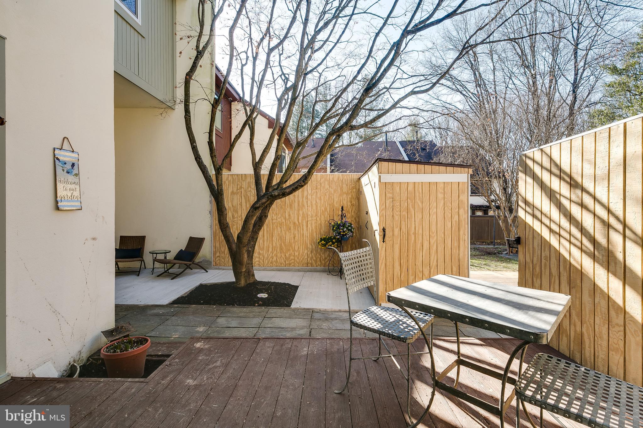 1589 Inlet Court Reston, VA 20190 - Photo 8 of 36 Dec and patio off the living room tree