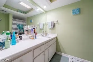 a view of a livingroom with furniture and a flat screen tv