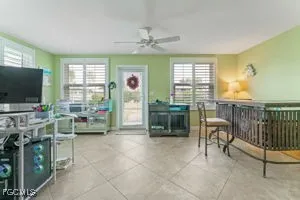 a view of a house with a big yard plants and trees