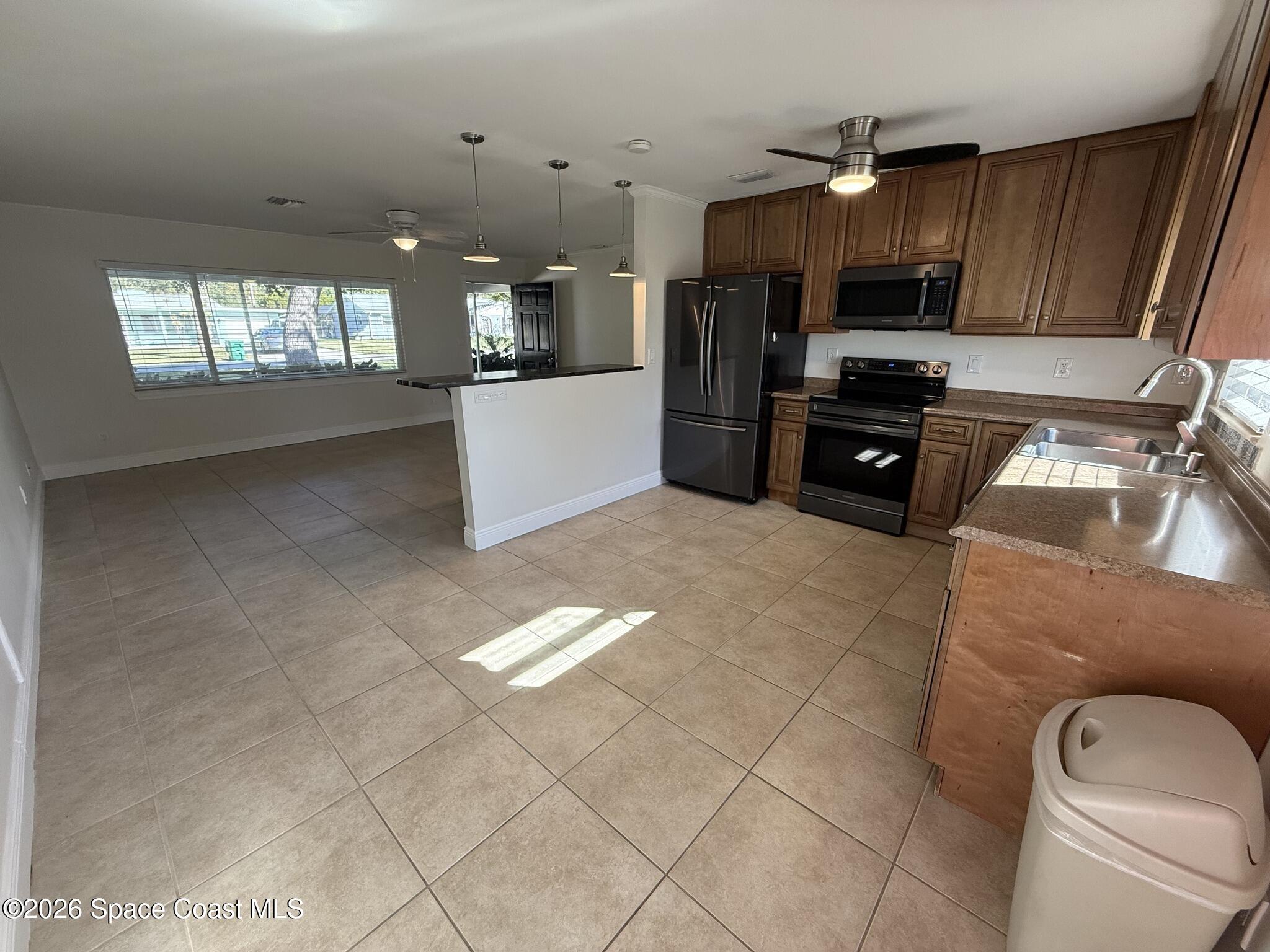 3383 Alice Street Melbourne, FL 32904 - Photo 12 of 24 623363580_10239575156747083_323913373233