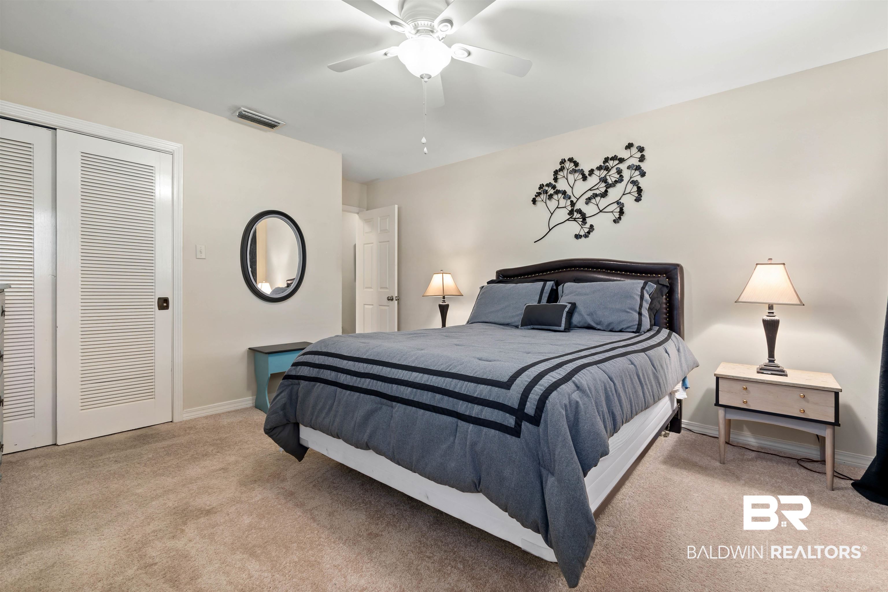 4051 East Canal Circle Mobile, AL 36619 - Photo 24 of 32 Carpeted bedroom with ceiling fan and a closet