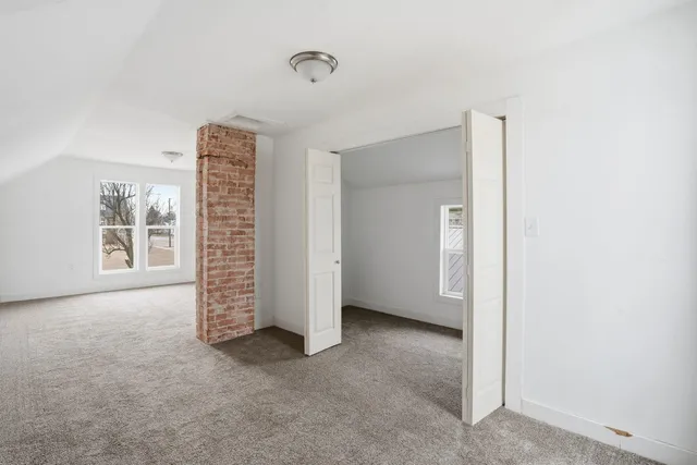 an empty room with windows