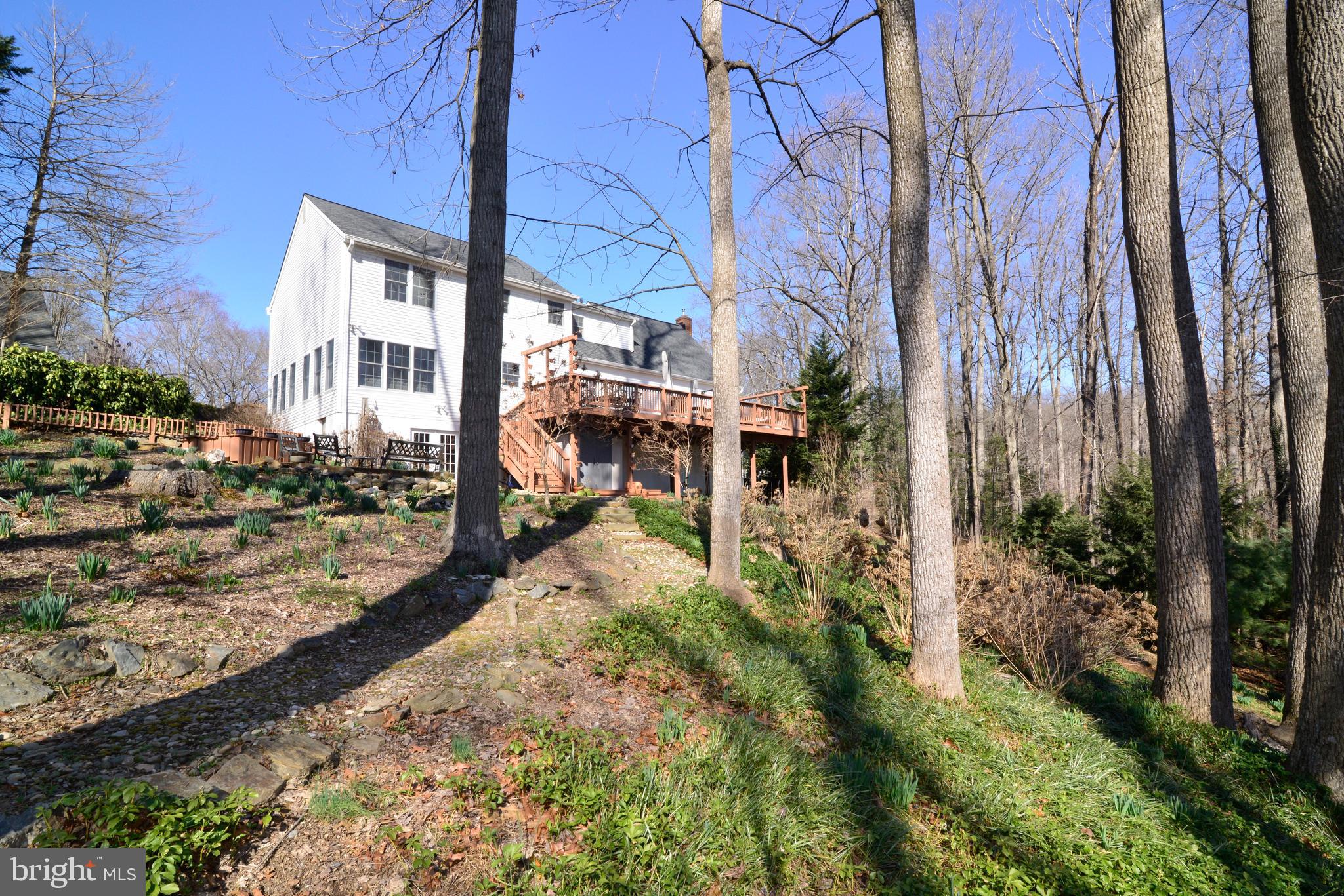 1966 Barton Hill Road Reston, VA 20191 - Photo 49 of 52 a view of a house with a yard covered in snow