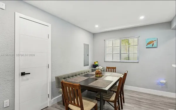 a view of a dining room with furniture