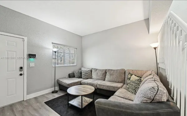 a living room with furniture and a couch