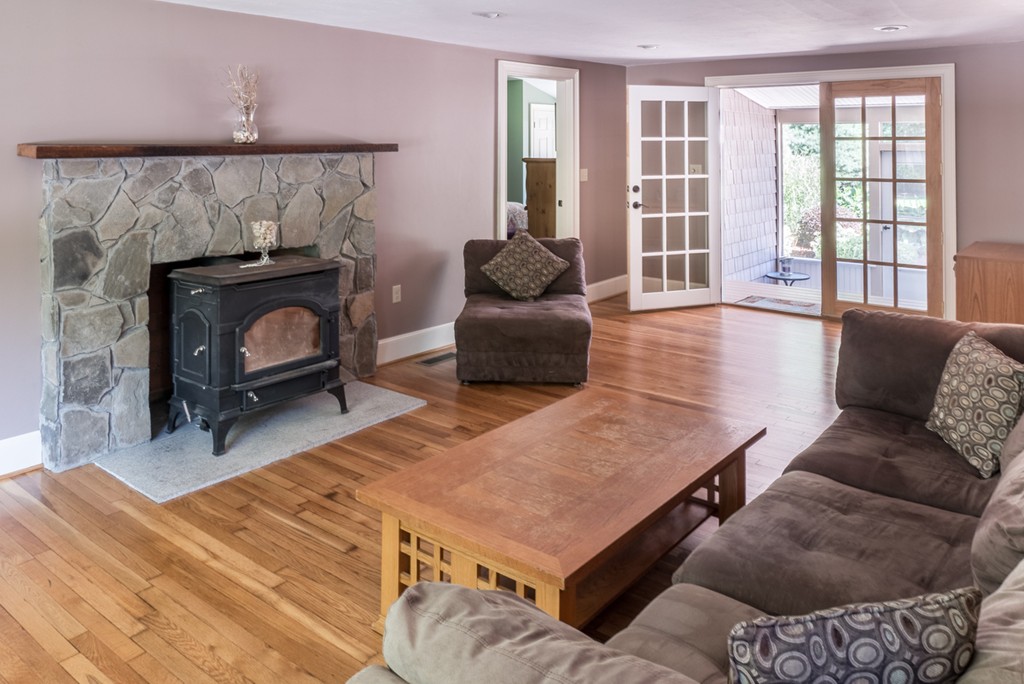51 Pole Plain Road Sharon, MA 02067 - Photo 3 of 9 a living room with furniture and a fireplace
