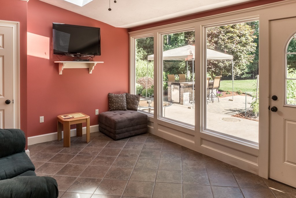 51 Pole Plain Road Sharon, MA 02067 - Photo 4 of 9 a living room with furniture and a flat screen tv