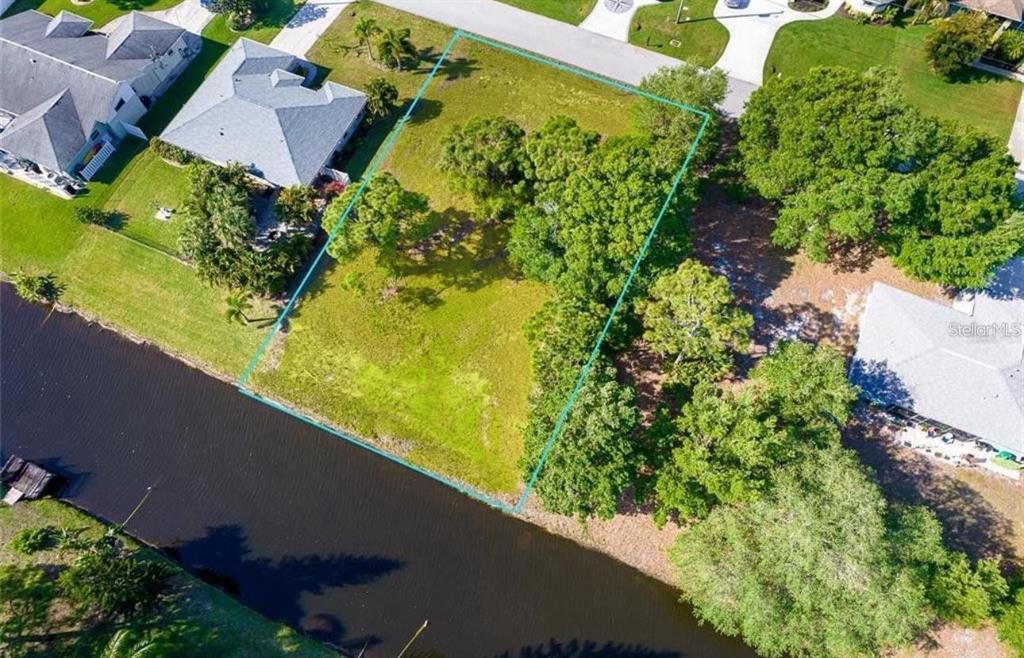 74 Mariner Lane Rotonda West, FL 33947 - Photo 1 of 7 a view of a garden