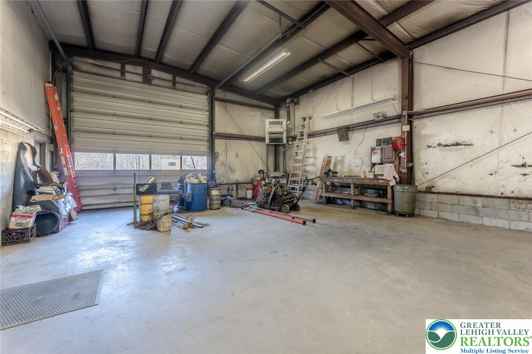 102 East Moorestown Road Wind Gap, PA 18091 - Photo 3 of 9 a view of a storage room with gym equipment