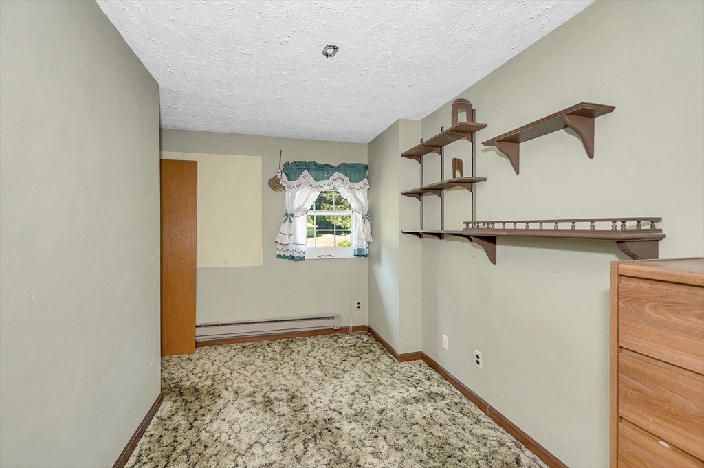 13 Judith Road Chelmsford, MA 01824 - Photo 13 of 36 a view of storage and utility room with closet
