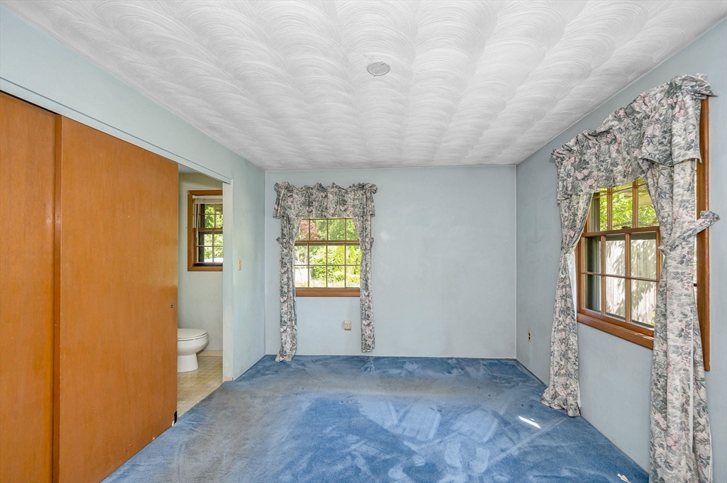 13 Judith Road Chelmsford, MA 01824 - Photo 14 of 36 an empty room with windows