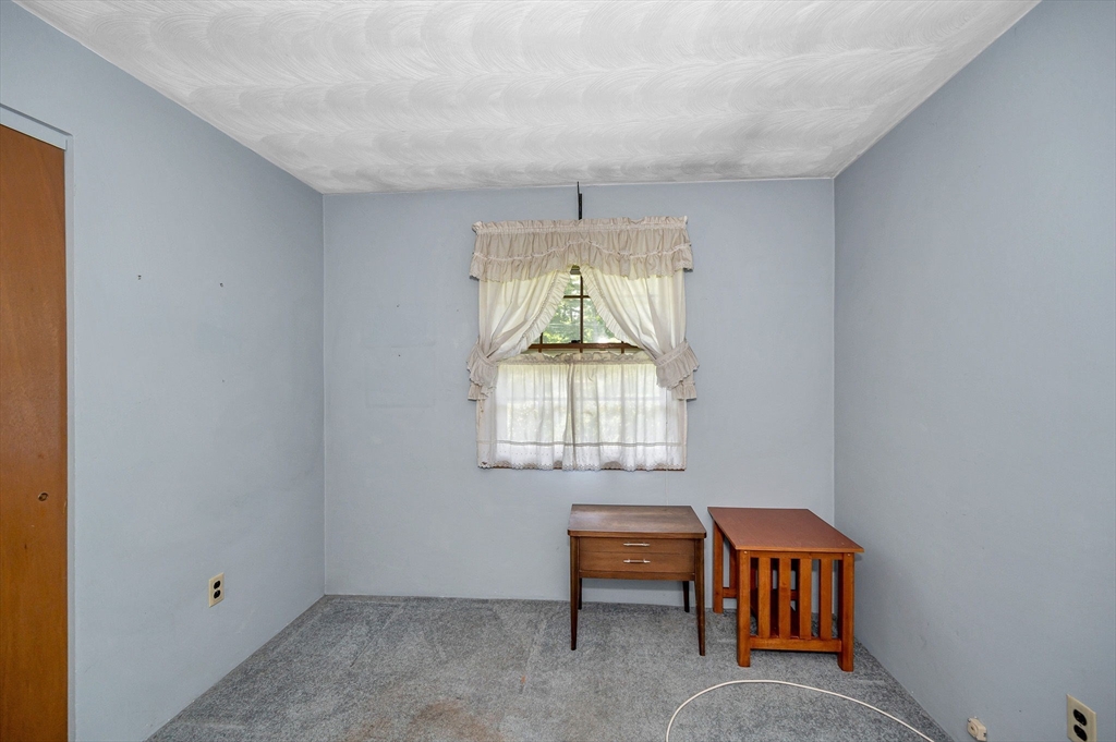13 Judith Road Chelmsford, MA 01824 - Photo 16 of 36 a room with furniture and a window