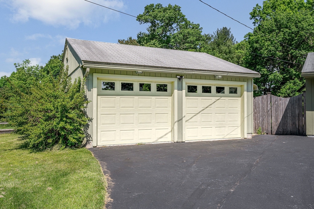 13 Judith Road Chelmsford, MA 01824 - Photo 27 of 36 a view of a house with a garage