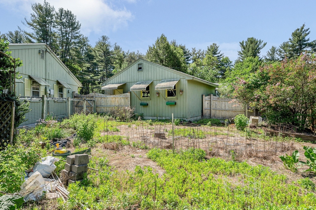 13 Judith Road Chelmsford, MA 01824 - Photo 28 of 36 a view of a house with a yard and plants