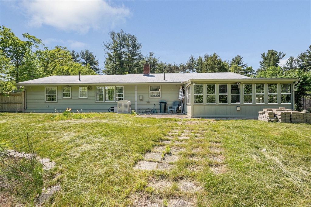 13 Judith Road Chelmsford, MA 01824 - Photo 29 of 36 a front view of a house with a garden