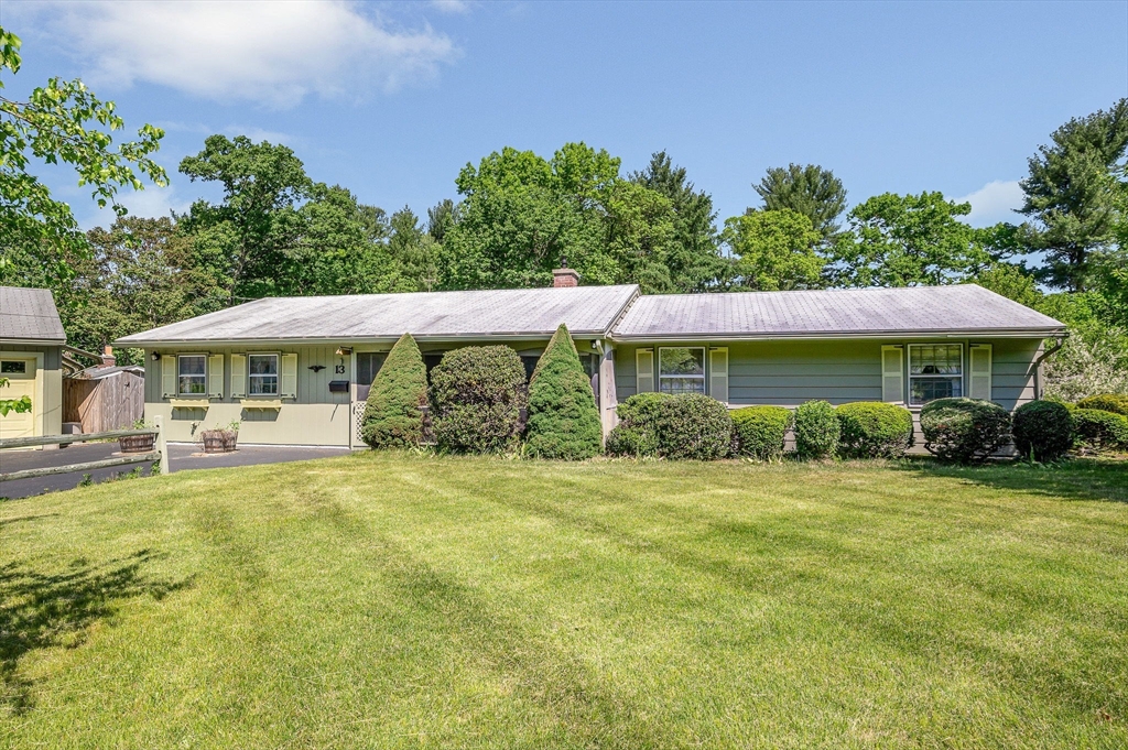 13 Judith Road Chelmsford, MA 01824 - Photo 3 of 36 a front view of a house with swimming pool having outdoor seating