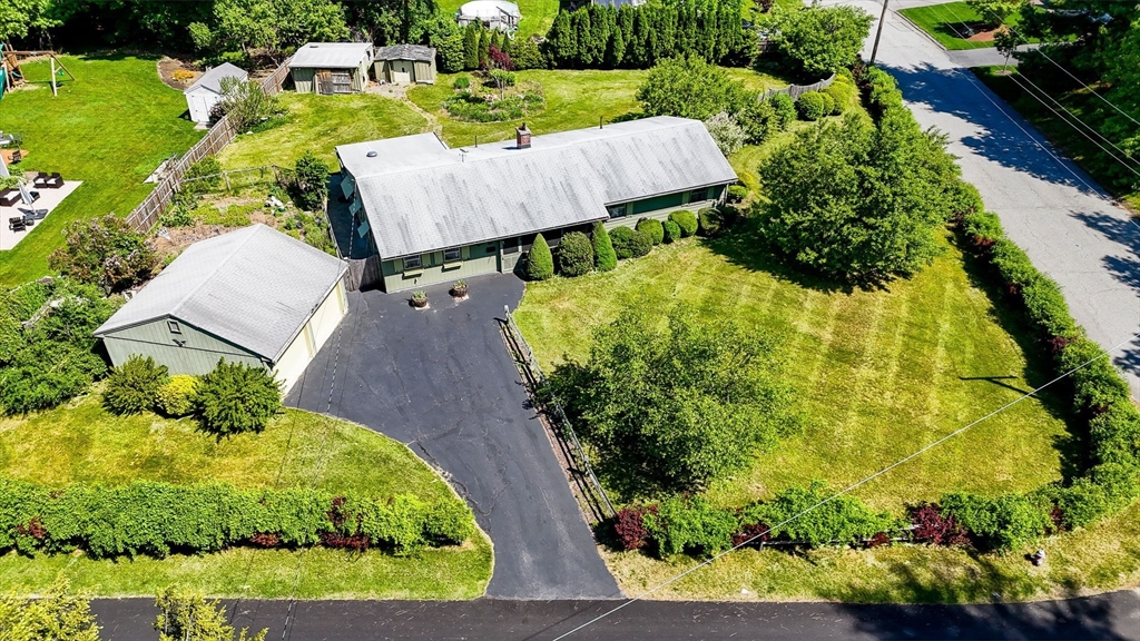 13 Judith Road Chelmsford, MA 01824 - Photo 33 of 36 a view of a garden with an outdoor space