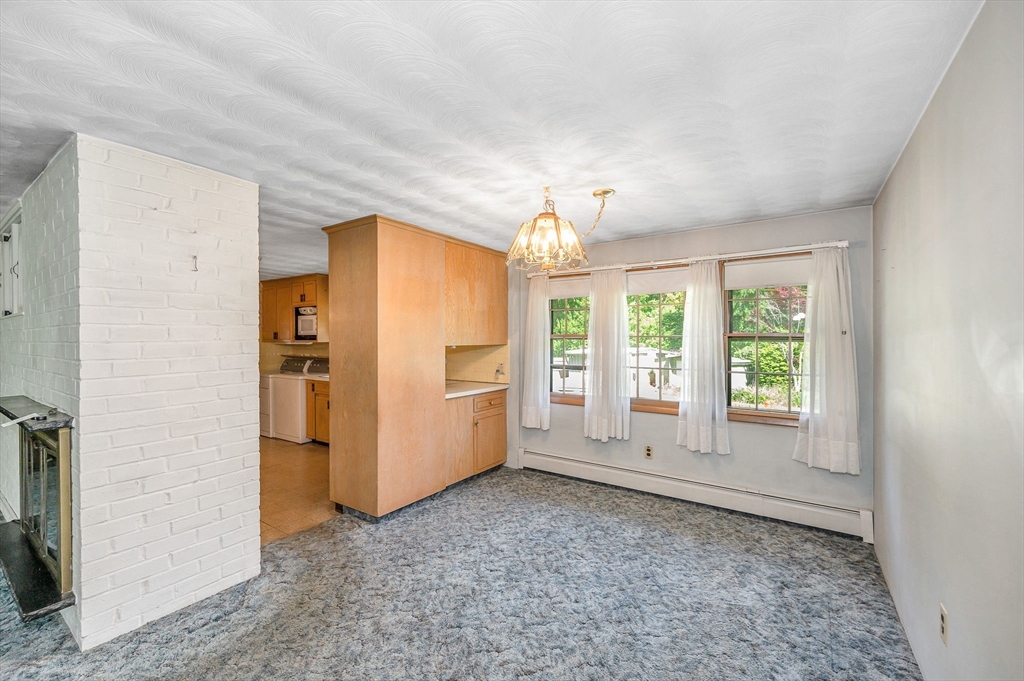 13 Judith Road Chelmsford, MA 01824 - Photo 9 of 36 a view of an empty room with a window